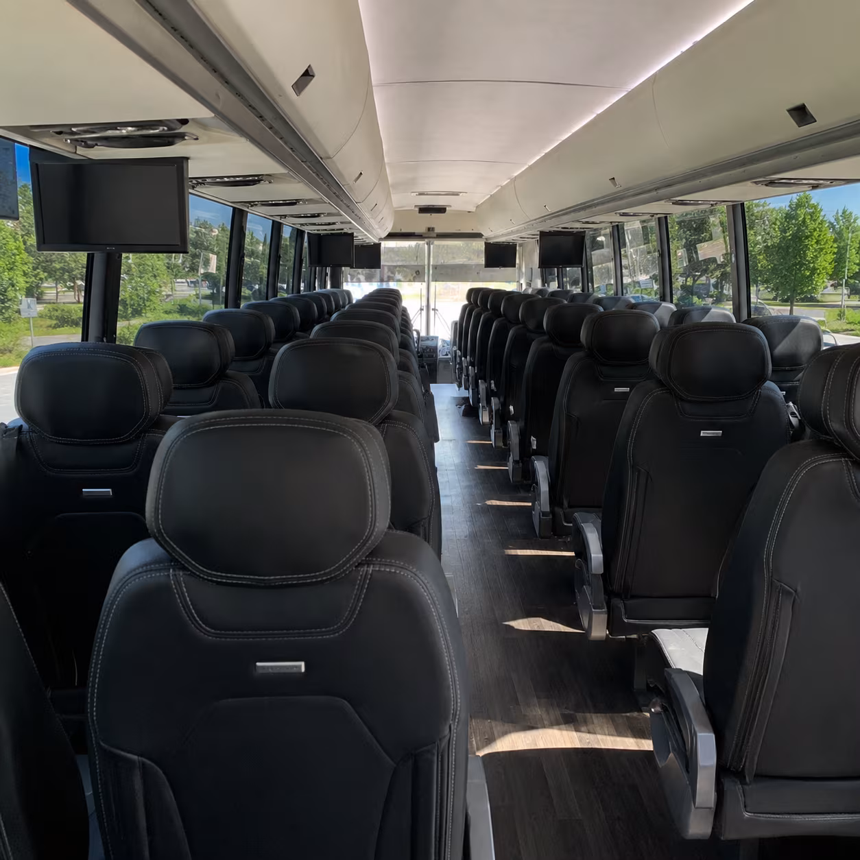 out of state charter bus rentals from rogers to dallas and little rock